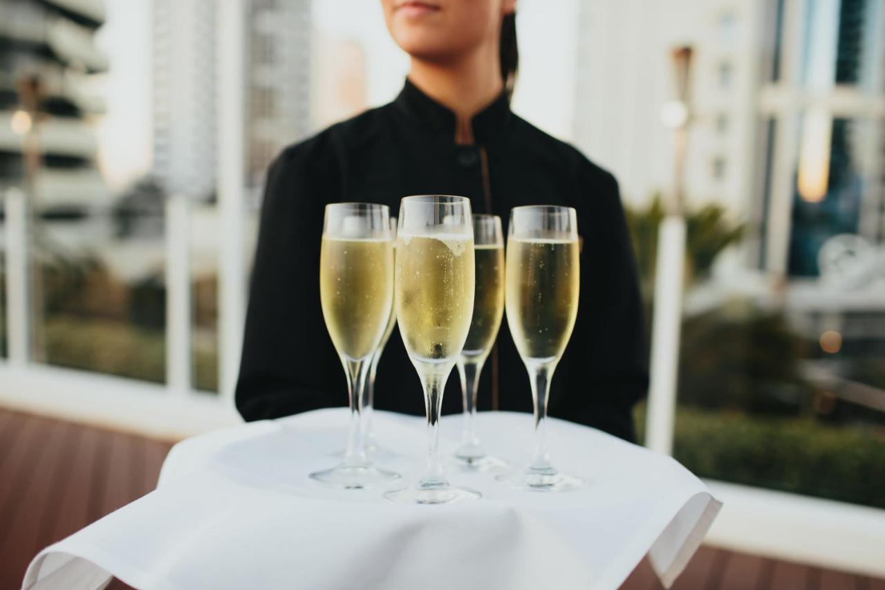 Sofitel Gold Coast Broadbeach Bagian luar foto A tray of champagne